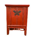 A C19th style Chinese red lacquer Wedding Cabinet with butterfly escutcheons with two drawers