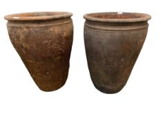 Two tall terracotta pots, 68cmH & 58cmH, with wear and some chips etc