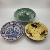 A large Studio Pottery bowl together with a Delft Charger, and one other