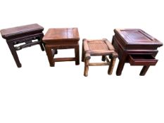 A collection of Chinese C19th Style low tables or stools. All of square form
