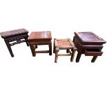 A collection of Chinese C19th Style low tables or stools. All of square form