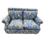 A good quality button upholstered two seater sofa on wooden bun feet, 135L x 88D x 83cmH (blue