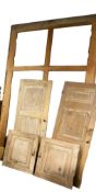 Reclamation pieces: a large pine frame, and pairs of wooden panelled/cupboard doors