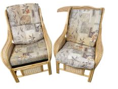 Two wicker style arm chairs with cushions and a cream leather sofa and chairs suite