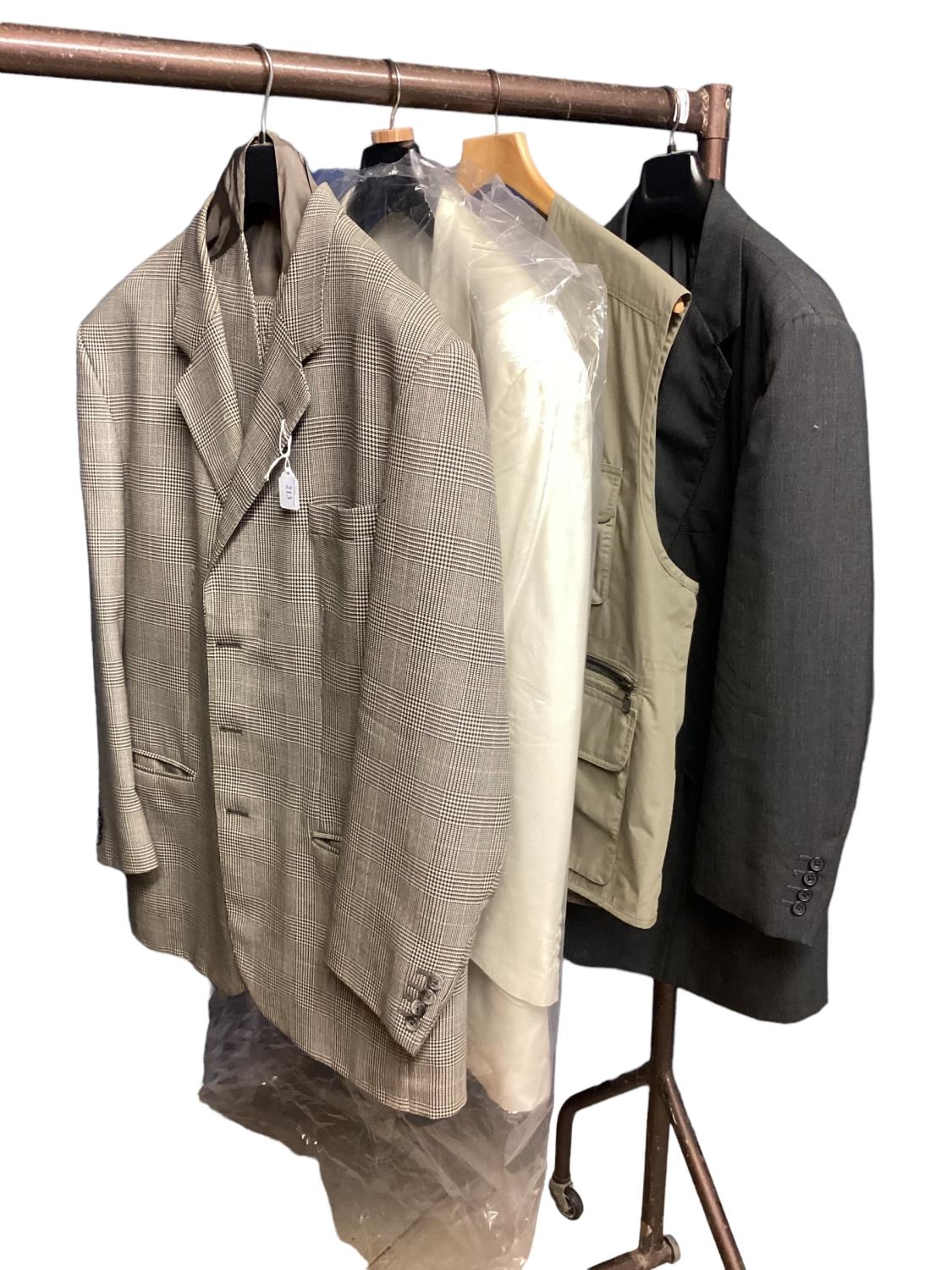 Clothing: a Prince of Wales chequed three piece gents suit, a cream jacket and a fishing waistcoat/