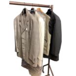 Clothing: a Prince of Wales chequed three piece gents suit, a cream jacket and a fishing waistcoat/