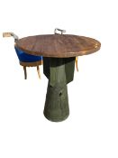 A "thousand pound bomb fin" converted into a retro circular top table 89cm diameter x 104 cm h