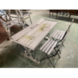 A small metal conservatory coffee table and a grey painted bistro garden table with four painted