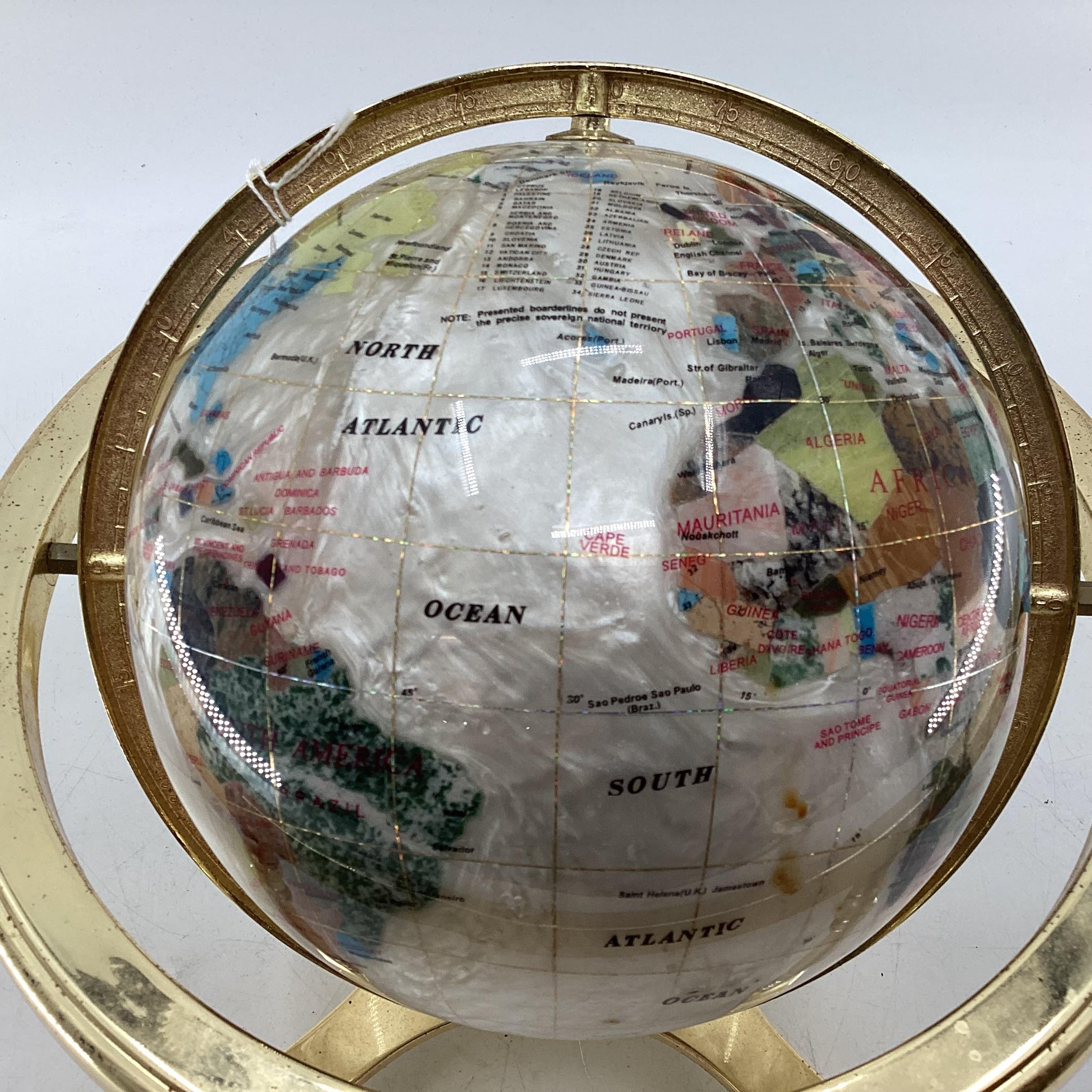 A table top gem set globe in gilt metal mount with compass to base, 27cmH - Image 2 of 4