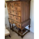 Mahogany and walnut Chest on Stand, two short over three long graduated drawers to a two drawer