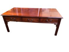 A low, three drawer modern reproduction coffee table, 122cm w x 62cm d x 46cm h