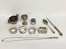 Collection of Sterling silver items to include napkin rings, egg cup, 216g silver, and a silver