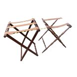 A pair of folding luggage racks