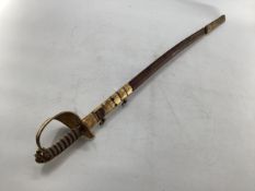 A C19th naval officers dress sword, shagreen wired grip, lion head pommel, and gilt metal basket,