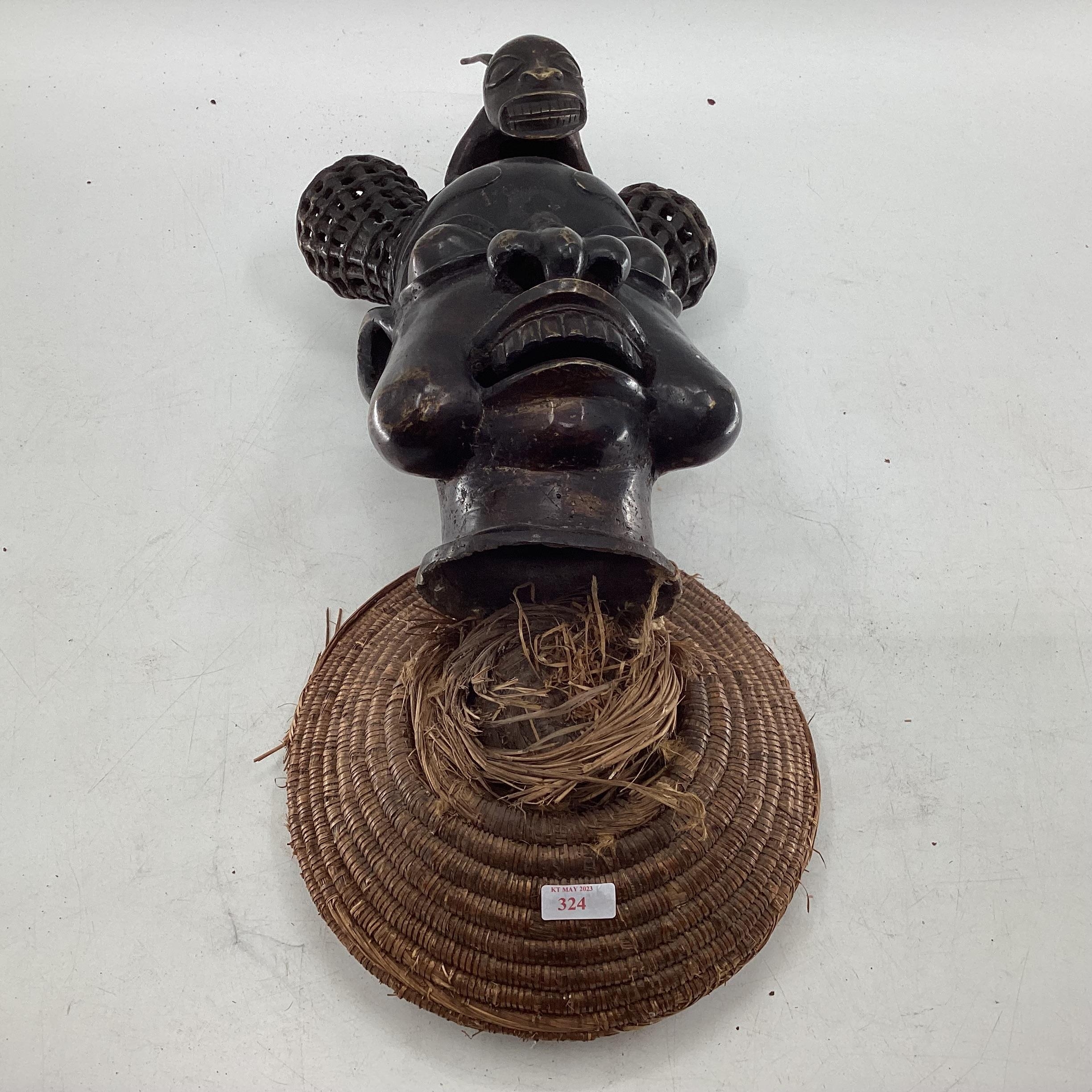 Mid to late C20th West African cast metal item depicting tribal chief topped with mythical - Image 2 of 6