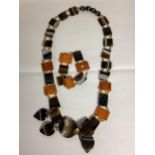 A banded agate mid C20th necklace and bracelet set