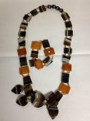 A banded agate mid C20th necklace and bracelet set