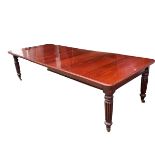Victorian mahogany extending oblong dining table, on 4 tapering reeded legs, with brass castors, 3