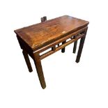 A C19th Style Chinese hard wood alter or side table, geometric pierced frieze on square legs (some