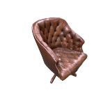 A good Hillcrest swivel tub arm chair in studded button back leather, with serpentine apron on a