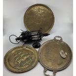 Three large copper trays, 1 with loop handles and work silver plating, together with gothic style