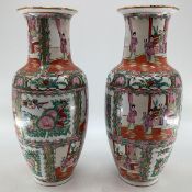 Pair of Famille Rose style baluster shaped vases with red character mark to base