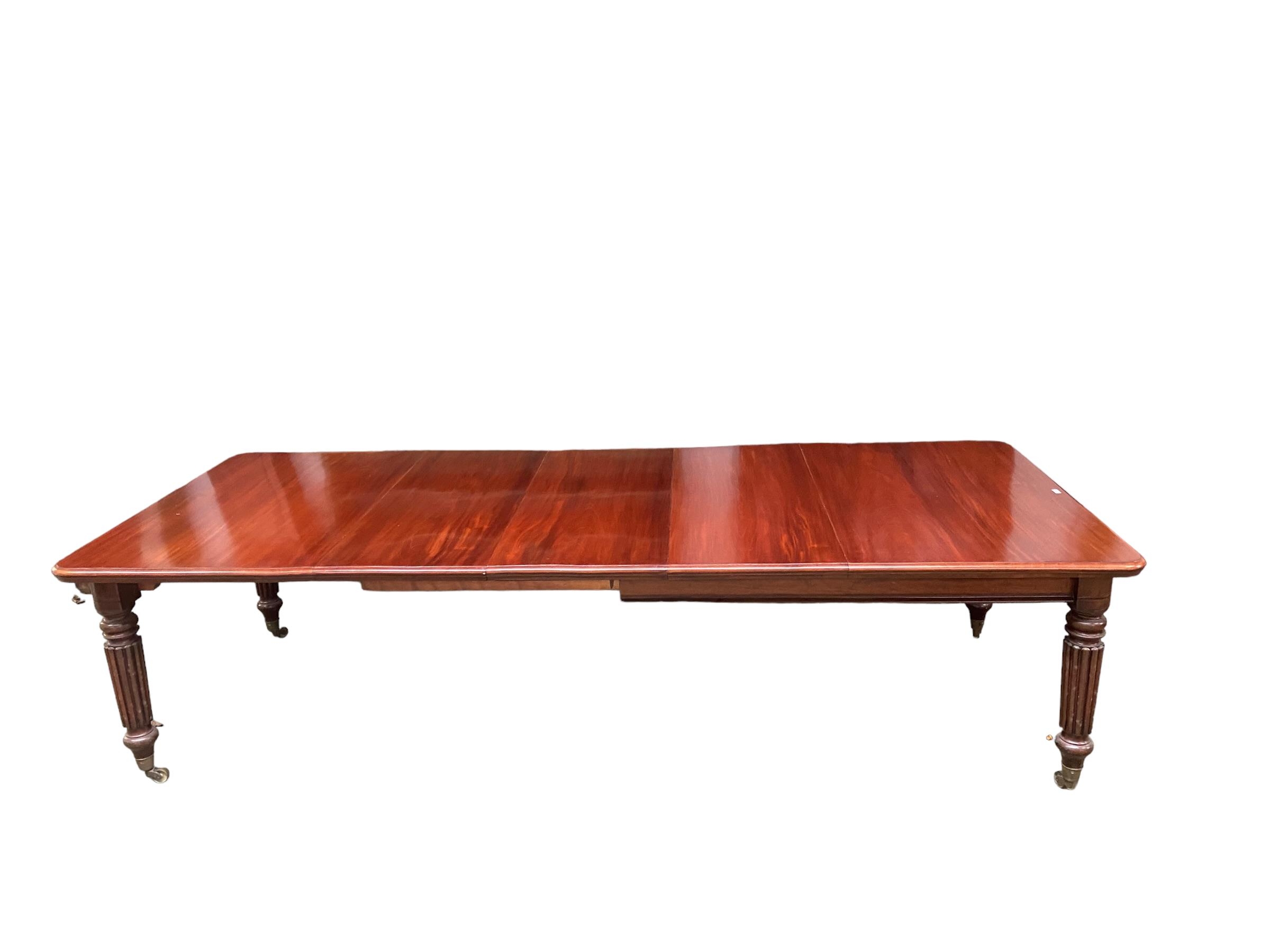 Victorian mahogany extending oblong dining table, on 4 tapering reeded legs, with brass castors, 3 - Image 2 of 3