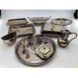 A collection of electro plated wares, lidded dishes, trays etc