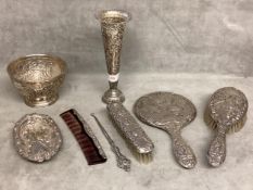 A collection of Sterling silver items to include a silver dressing set, bowl, dish, comb, etc