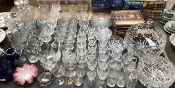 A large collection of crystal glassware to include bowls brandy balloons hock glass and other items
