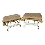 Pair of Regency style x framed upholstered stools painted with gilt decoration, with fitted