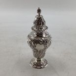 Stirling silver sugar shaker with strolling chased design by Goldsmith and Silversmiths Company