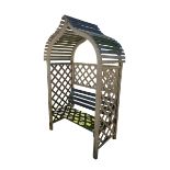 A decorative wooden garden arched bench seat, with lattice style sides and back, and a slatted
