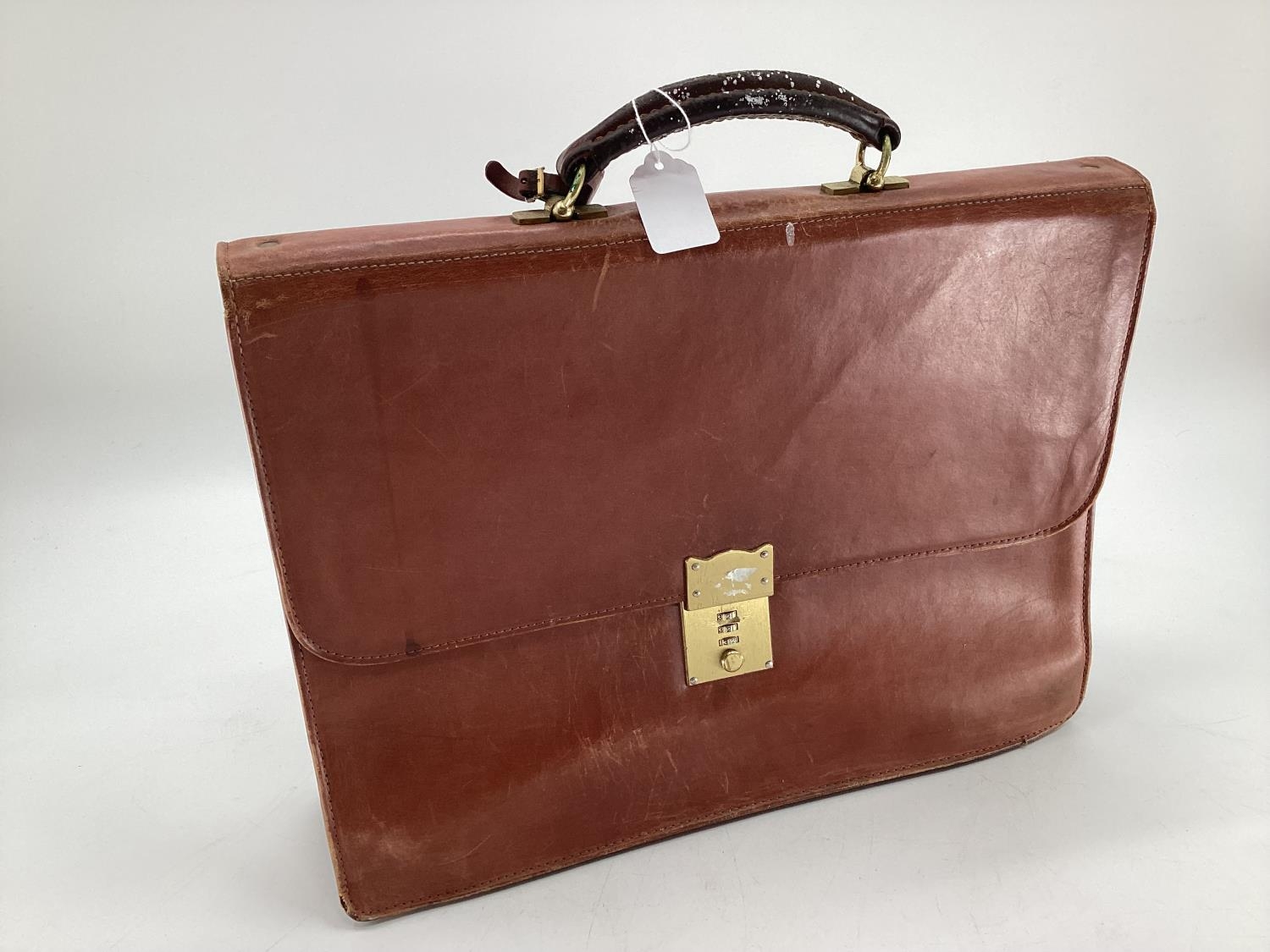 A vintage tan leather attache or brief case, 43 x 37cm