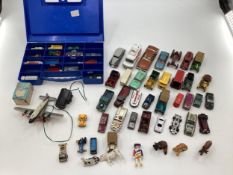 A collection of play worn Dinky and Matchbox Vehicles