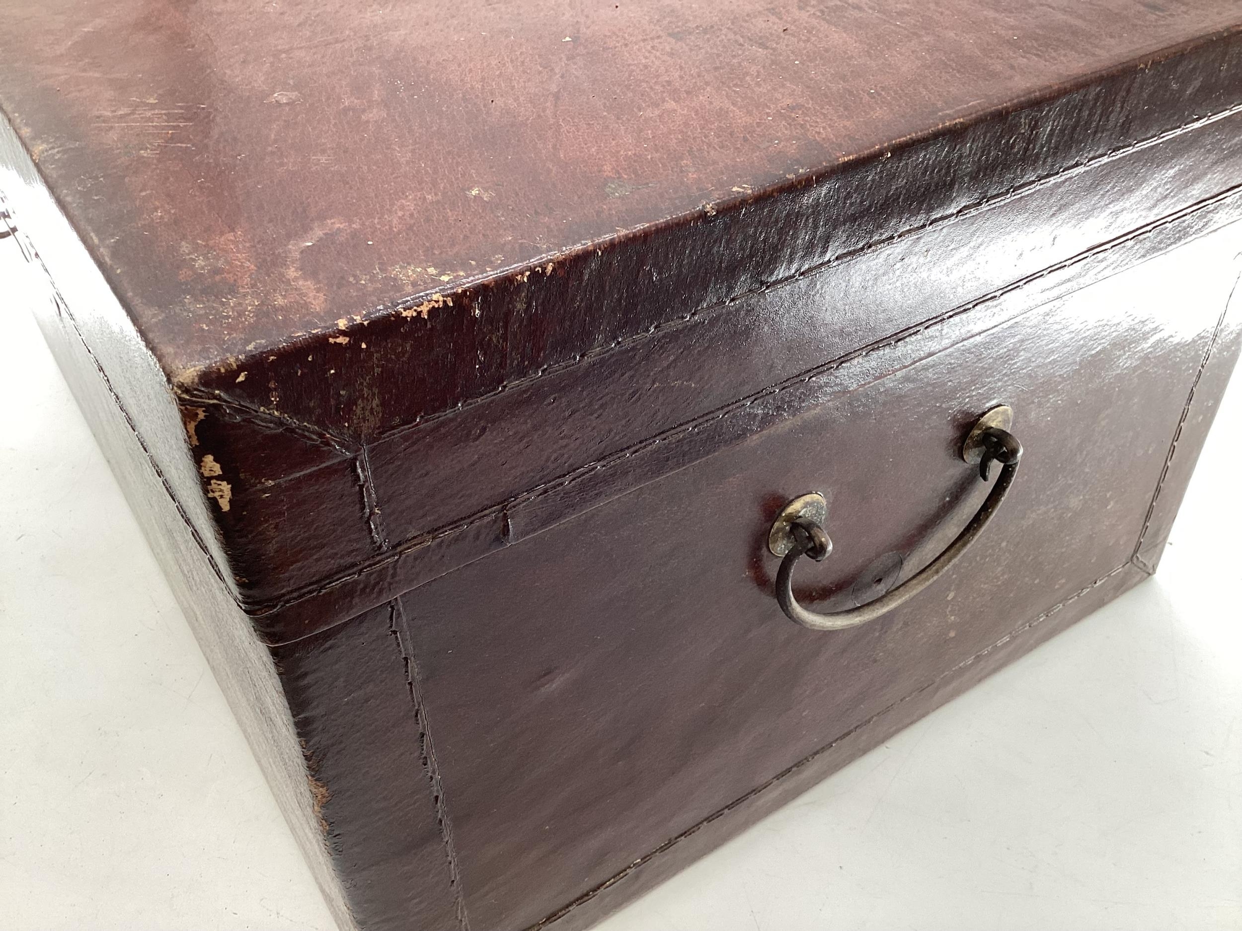 A near pair of Chinese C19th style lacquer trunks with fabric lined interiors and brass carry - Image 6 of 21