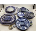 Large collection of blue and white ceramics to include Willow pattern meat plates, bowls etc