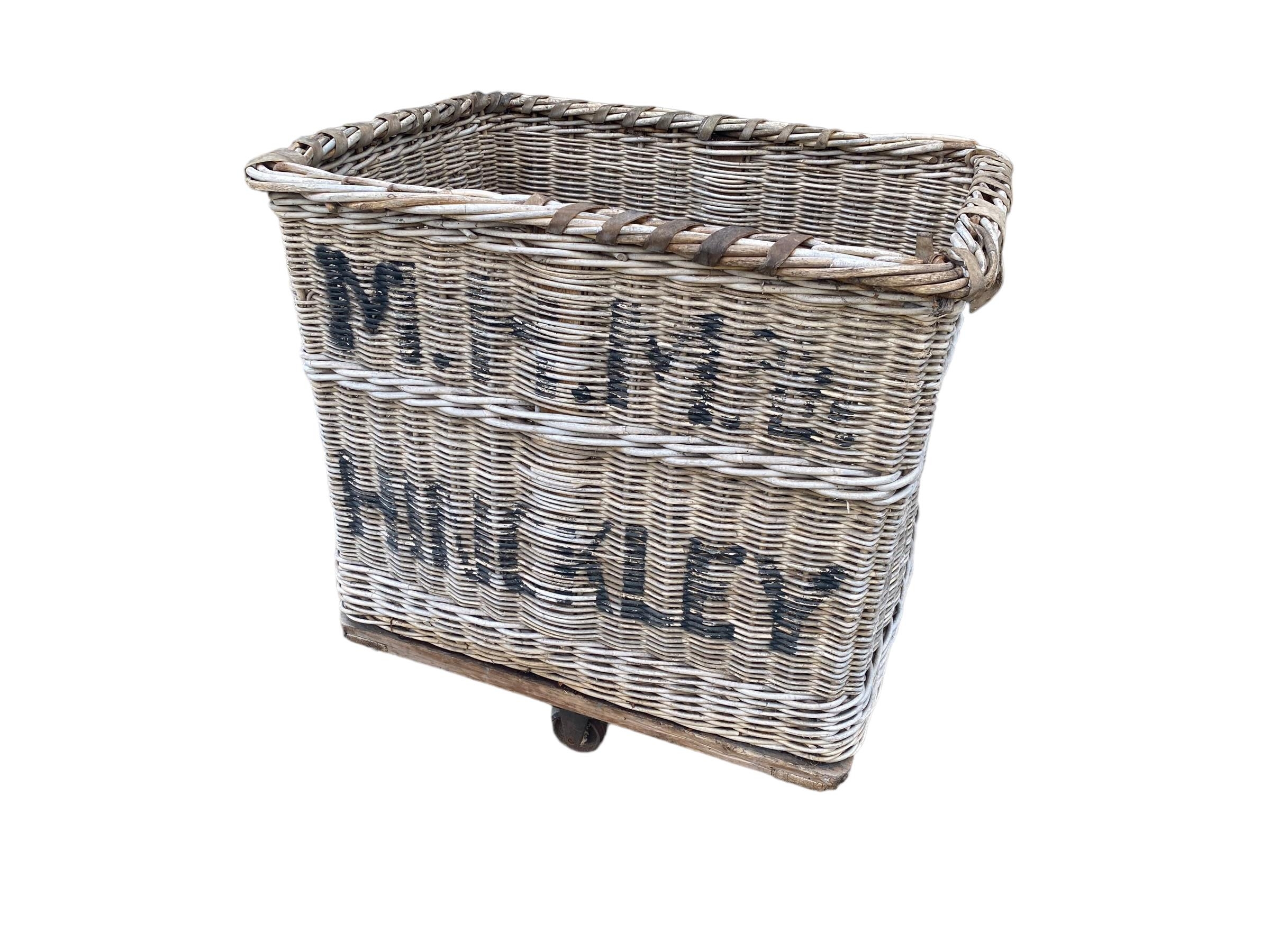 A very large vintage wicker laundry basket/ log/wood basket. Some wear to wheels/base. Very - Image 2 of 2