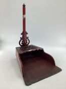 A large stylised Chinese lacquered dust pan with pierced design, 69 x 49 x 39cm