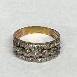 A C19th unmarked yellow metal and diamond ring set throughout with the three lines of an old cut