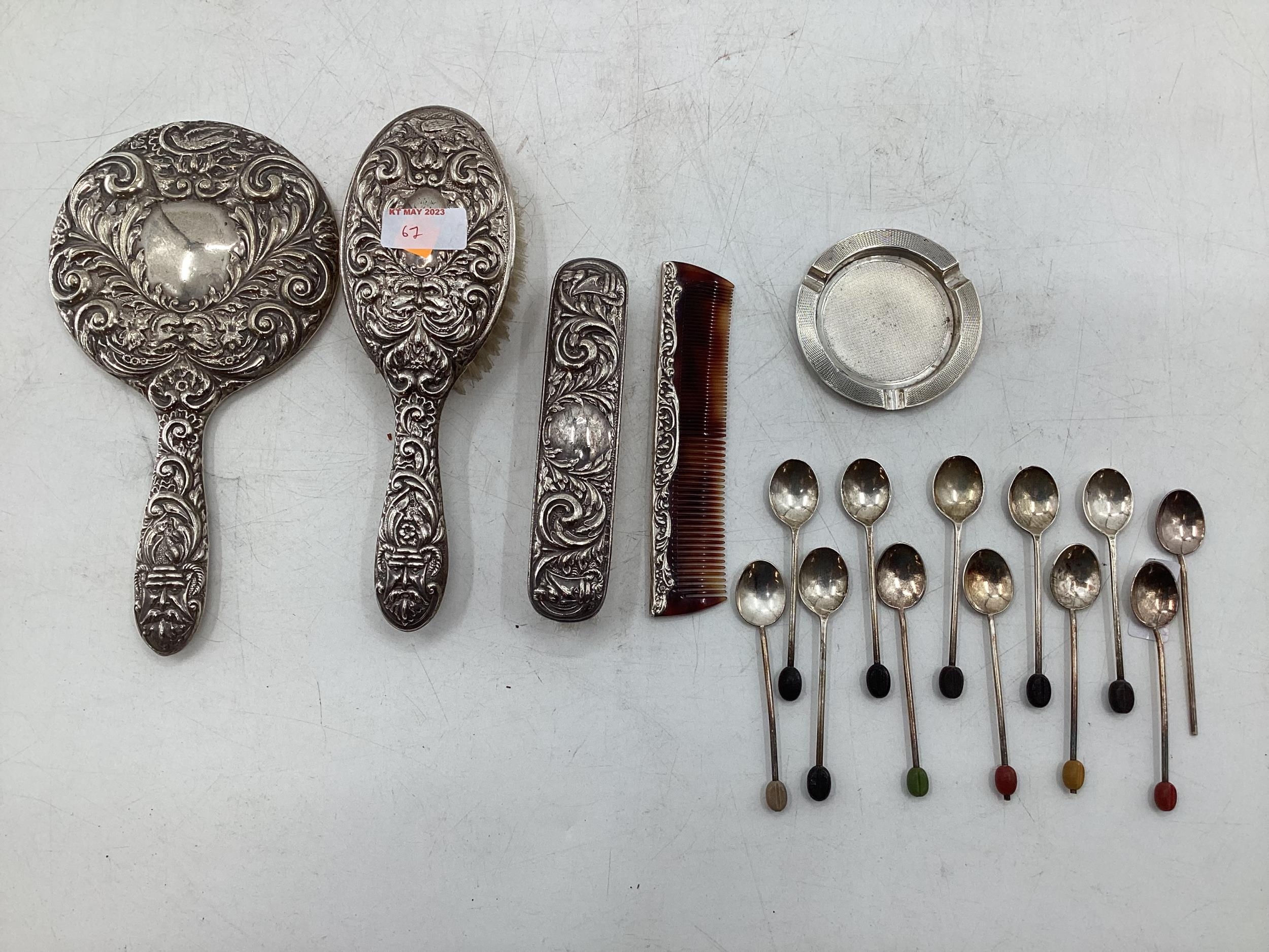 Collection of Stirling silver items to include a dressing set, collection of coffee spoons with bean