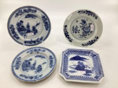 Four Oriental style blue and white plates