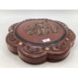 A Chinese C19th Style round lacquered sectional box with lid bearing faded out figures, 41 x 7xm