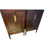 A pair of C19th/C20th style Chinese Marriage Cabinets, two cupboard doors over carved stylised