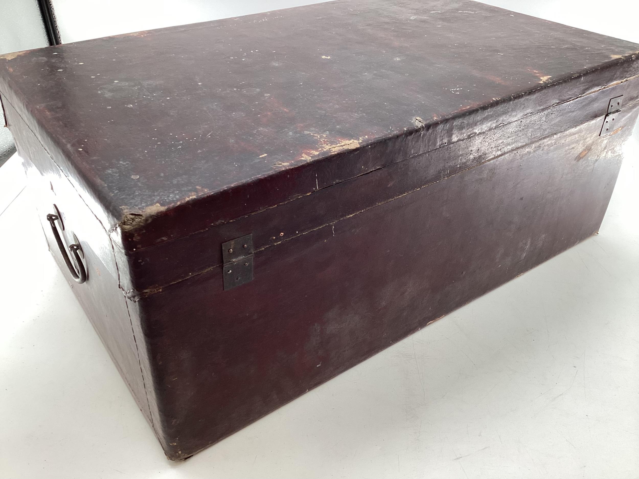 A near pair of Chinese C19th style lacquer trunks with fabric lined interiors and brass carry - Image 14 of 21