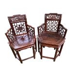 A near pair of C19th Style Chinese armchairs, pierced and carved backs, on hexagonal seat, with