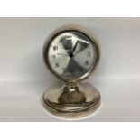 A Sterling silver mounted desk clock by Kemp Bros, Chester, 1927
