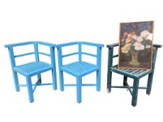Three Heals garden chairs, curved seats with slat backs some wear and a picture of a still life
