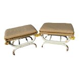 Pair of Regency style x framed upholstered stools, painted with gilt decoration with upholstered