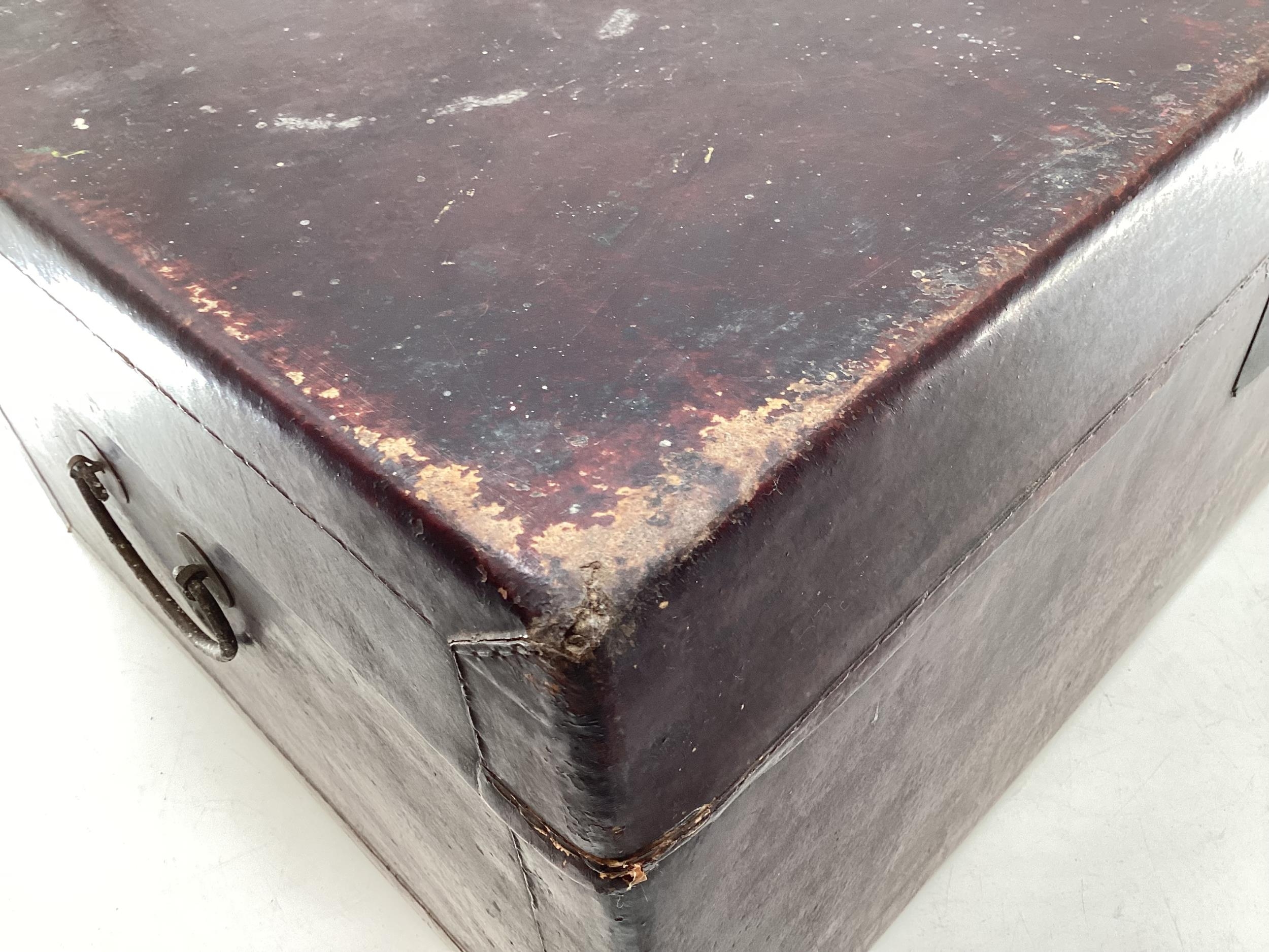 A near pair of Chinese C19th style lacquer trunks with fabric lined interiors and brass carry - Image 10 of 21